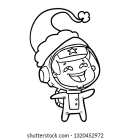 hand drawn line drawing of a laughing astronaut wearing santa hat