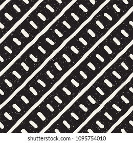 Hand drawn lines seamless grungy pattern. Abstract geometric repeating tile texture in black and white.