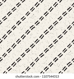 Hand drawn lines seamless grungy pattern. Abstract geometric repeating tile texture in black and white.