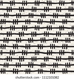 Hand drawn lines seamless grungy pattern. Abstract geometric repeating tile texture in black and white.