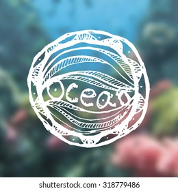 Hand Drawn Logotype On Blurred Vector Background. Marine Life Design.Ocean. Suitable for design and ads maritime centers, diving centers