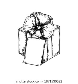 Hand drawn luxury gift box with a bow and greeting card. Vector illustration in a sketch style isolated on white background. place for text