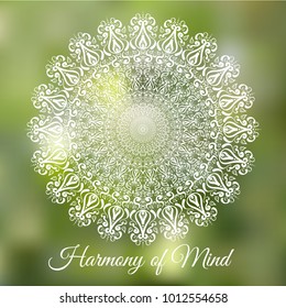Hand drawn mandala design element on blurred background. Yoga motivational poster. Beautiful floral background for resort and spa.  Indian decorative element. Inspiration quote