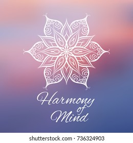 Hand drawn mandala design element on blurred background.  Yoga motivational poster. Beautiful floral background for resort and spa.  Indian decorative element. Inspiration quote
