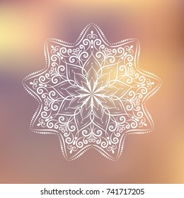 Hand drawn mandala design element on blurred background.  Beautiful floral background for resort and spa.  Indian decorative element. Inspiration quote
