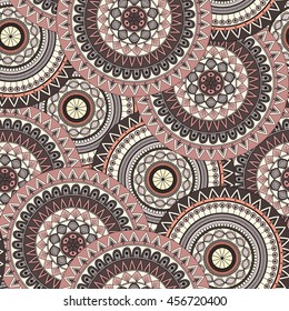 Hand drawn mandala ethnic seamless pattern. Can be used for fabric, wallpaper, textile and background.