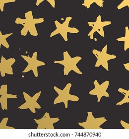 Hand drawn metallic paint seamless pattern. Gold Stars background. Abstract brush drawing. Grunge Vector art illustration