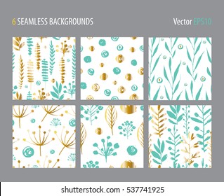 Hand drawn mint blue & gold ink painted branches seamless backgrounds set