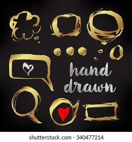 Hand Drawn monochrome texture elements set in gold over black. Vector illustration isolated on white. Abstract artistic ink hand painted spots. Text template. Grunge texture. Artist collection 