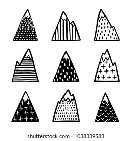 Hand drawn mountains set. Scandinavian style cute drawing design elements for prints, textile design, cards, home decor. Monochrome vector illustration.