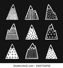 Hand drawn mountains set. Scandinavian style cute drawing design elements for prints, textile design, cards, home decor. Monochrome vector illustration.