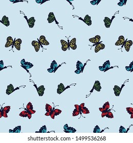 Hand drawn multi colored butterflies on a light blue background.Perfect for scrap booking , fashion and home decor projects. Surface pattern design.