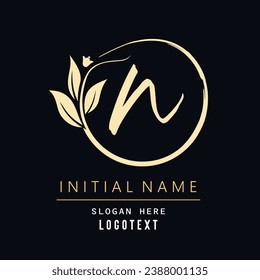 hand drawn N letters Logo design. Brushstroke N Letter Logo Design. luxury initial N logo design isolated leaf and flower.eps8