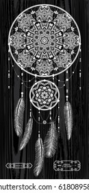 Hand drawn Native American Indian talisman dream catcher with feathers. Vector hipster illustration - white on black. Ethnic design, boho chic, tribal symbol for interior print, Poster, icon, tattoo