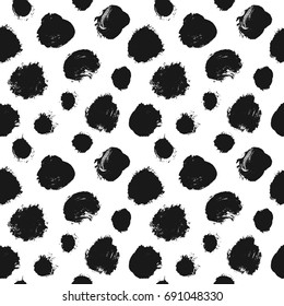 Hand drawn paint brush art texture of ink black stains blobs and drops seamless background