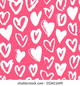 Hand drawn paint seamless pattern. Pink and white hearts background. Abstract brush drawing. Grunge Vector art illustration