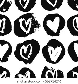Hand drawn paint seamless pattern. Black and white hearts background. Abstract brush art drawing. Grunge Vector fashion illustration. Female texture