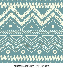 Hand drawn painted ethnic seamless pattern with grunge effect. Tribal  traditional pattern of American indians. Use for wallpaper, pattern fills, web page background, fabric. Zigzag and stripe line.