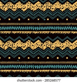 Hand drawn painted ethnic seamless pattern with grunge effect. Tribal  traditional pattern of American indians. Use for wallpaper, pattern fills, web page background, fabric. Zigzag and stripe line.