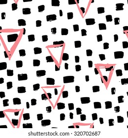 Hand drawn painted seamless geometric pattern with triangles  for different kind prints and design.
