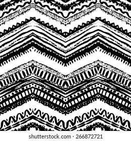 Hand drawn painted seamless pattern. Vector illustration for tribal design. Ethnic motif. Zigzag and stripe line. Black and white colors. For invitation, web, textile, wallpaper, wrapping paper.