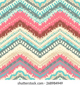 Hand drawn painted seamless pattern. Vector illustration for tribal design. Ethnic motif. Zigzag and stripe line. Retro colors. For invitation, web, textile, wallpaper, wrapping paper.