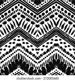 Hand drawn painted seamless pattern. Vector illustration for tribal design. Ethnic motif. Zigzag and stripe line. Black and white colors. For invitation, web, textile, wallpaper, wrapping paper.