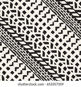 Hand drawn painted seamless pattern. Vector tribal design background. Ethnic motif. Geometric ethnic stripe lines illustration. Black and white colors. For prints, textile, wallpaper, wrapping paper.