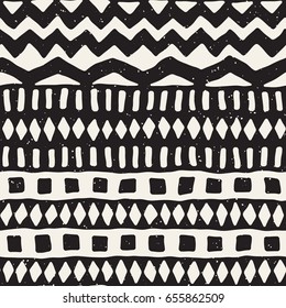 Hand drawn painted seamless pattern. Vector tribal design background. Ethnic motif. Geometric ethnic stripe lines illustration. Black and white colors. For prints, textile, wallpaper, wrapping paper.