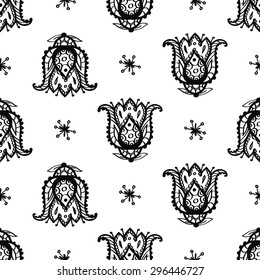 Hand Drawn paisley and mehendi graphic black line lace fringe and tulip decoration items on white background. Set of isolated floral wedding decorative elements. Chess grid order