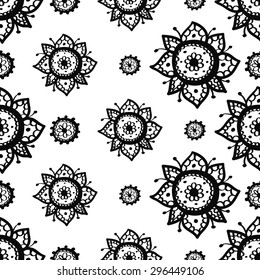 Hand Drawn paisley and mehendi graphic black line lace circle and dahlia decoration items on white background. Set of isolated floral wedding decorative elements. Chess grid order