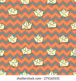 hand drawn paper ships on contrast chevron background, nautical vector seamless pattern, childish illustration, design can be used for paper, wallpaper, textile, fabric, different surfaces