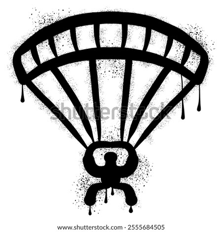 Hand drawn parachute with black spray paint graffiti