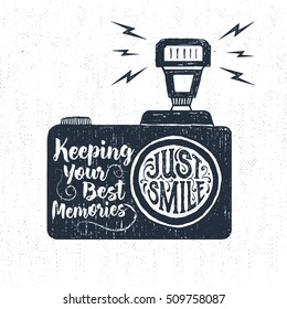 Hand drawn party label with textured photo camera vector illustration and "Just smile. Keeping your best memories" lettering.