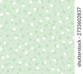 Hand drawn pattern with flowers, and leaves . Seamless pattern with small white  flowers and leaves on mint background.