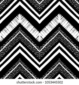 Hand drawn pattern. Zigzag and stripe line. Vector illustration for tribal design. Black and white colors. For textile, wallpaper, wrapping paper. Ethnic theme