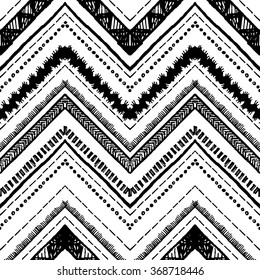 Hand drawn pattern. Zigzag and stripe line. Vector illustration for tribal design. Black and white colors. For textile, wallpaper, wrapping paper. Ethnic theme