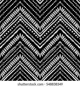 Hand drawn pattern. Zigzag and stripe line. Vector illustration for tribal design. Black and white colors. For textile, wallpaper, wrapping paper. Ethnic theme