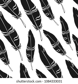 Hand drawn peacock feather seamless pattern on black background. Design element for wrapping paper, textile, fabric, wallpaper. 