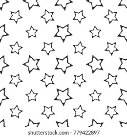 Hand drawn pen and ink stroke stars seamless patterns. Isolated decorative symbols and elements. Black outline sketch on white background