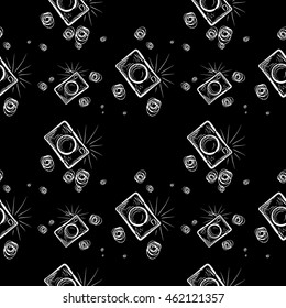 Hand drawn photo camera on chalkboard background. Vector seamless pattern.