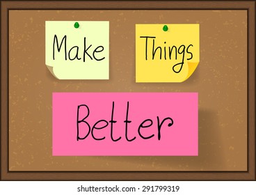 Hand drawn the phrase make things better on notes are pinned to a cork message board with wood frame,