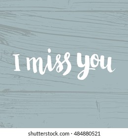 Hand drawn phrase I miss you. Lettering design for posters, t-shirts, cards, invitations, stickers, banners, advertisement. Vector.