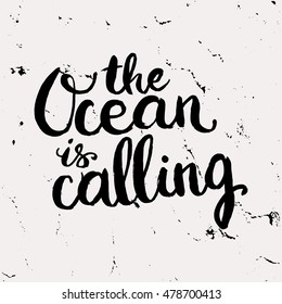 Hand drawn phrase The Ocean is calling. Lettering design for posters, t-shirts, cards, invitations, stickers, banners, advertisement. Vector.
