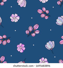 Hand drawn pink and purple flowers with white dots on classic blue background. Seamless spring floral pattern.