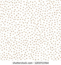 Hand drawn polka dot seamless pattern, texture. Elegant gold dots.