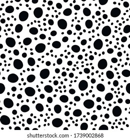 Hand drawn polka dot seamless pattern. Random geometric pebble wallpaper. Simple sea stones backdrop. Design for fabric, wrapping paper. Vector illustration