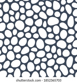 Hand drawn polka dot seamless pattern. Random geometric pebble wallpaper. Simple stones backdrop. Design for fabric, wrapping paper. Vector illustration