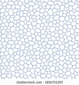 Hand drawn polka dot seamless pattern. Random geometric pebble wallpaper. Simple stones backdrop. Design for fabric, wrapping paper. Vector illustration