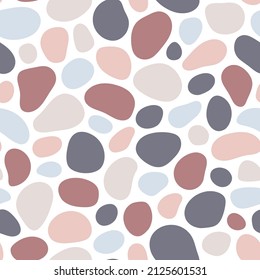 Hand drawn polka dot seamless pattern. Random geometric pebble wallpaper. Simple stones backdrop. Design for fabric, wrapping paper. Vector illustration